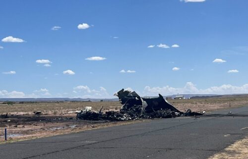 The remains of the medical transport plane are seen near Chinle Airport in Arizona on August 5.