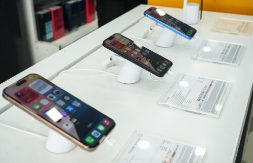 Apple's iPhone 16 series are displayed for sale at an electronics store in Srinagar