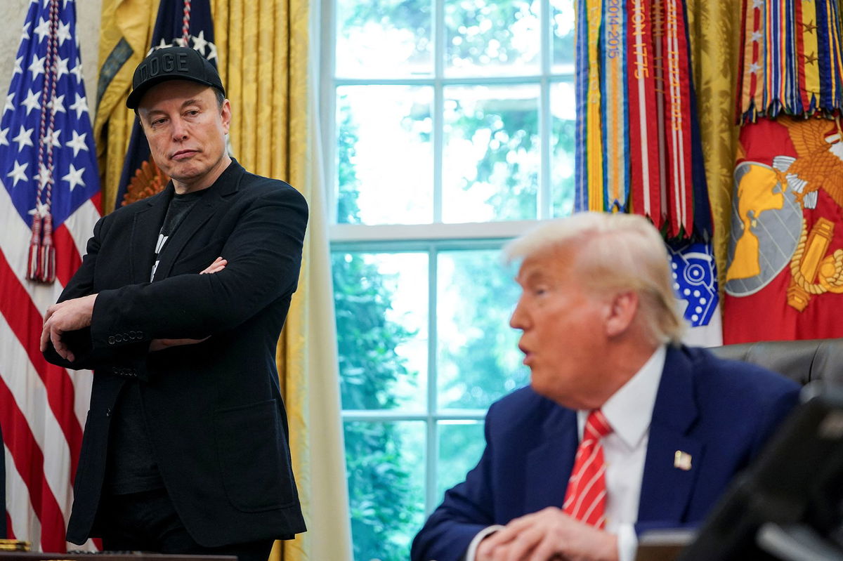 <i>Nathan Howard/Reuters via CNN Newsource</i><br/>US President Donald Trump and Elon Musk attend a press conference in the Oval Office of the White House in Washington