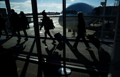 Passengers make their way through the terminal at Washington Dulles International Airport in Dulles