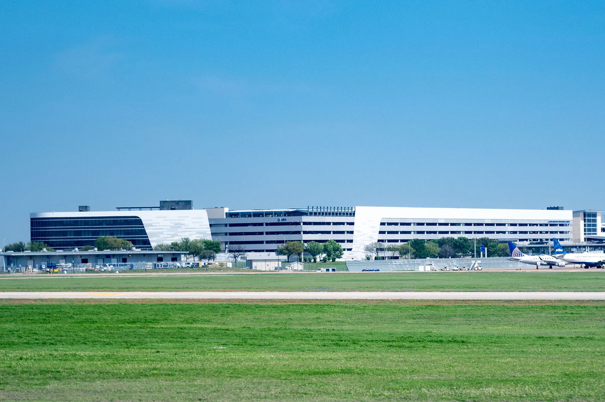 <i>Smith Collection/Gado/Getty Images via CNN Newsource</i><br/>Aircraft park near terminal buildings in 2023 at Austin-Bergstrom International Airport in Texas.