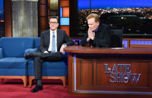Stephen Colbert and Conan O'Brien are pictured on the Late Show in 2019. While receiving a TV Academy Hall of Fame award