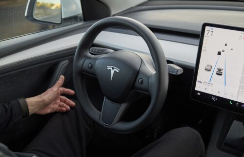 A Tesla Model Y equipped with Tesla's "Autopilot" feature. Federal safety regulators are looking at whether or not Tesla is complying with rules to promptly report accidents involving its autonomous driving technology.