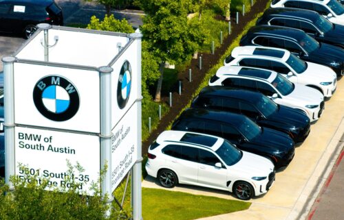 Customers view new vehicles for sale at a Volkswagen dealership in Miami. Car prices have not yet gone up significantly due to tariffs. But with 2026 models about to hit dealerships