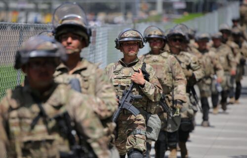 Members of the National Guard walk in formation in Los Angeles on June 14.