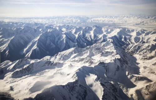 An aerial view taken from a commercial plane shows Tian Shan Range in Kyrgyzstan on April 29