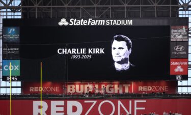 The video board shows a tribute to Charlie Kirk at State Farm Stadium on September 14 in Glendale