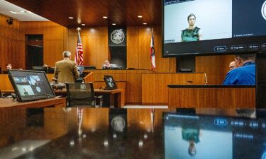 A person looked over the Utah Valley University courtyard where political activist Charlie Kirk was shot.