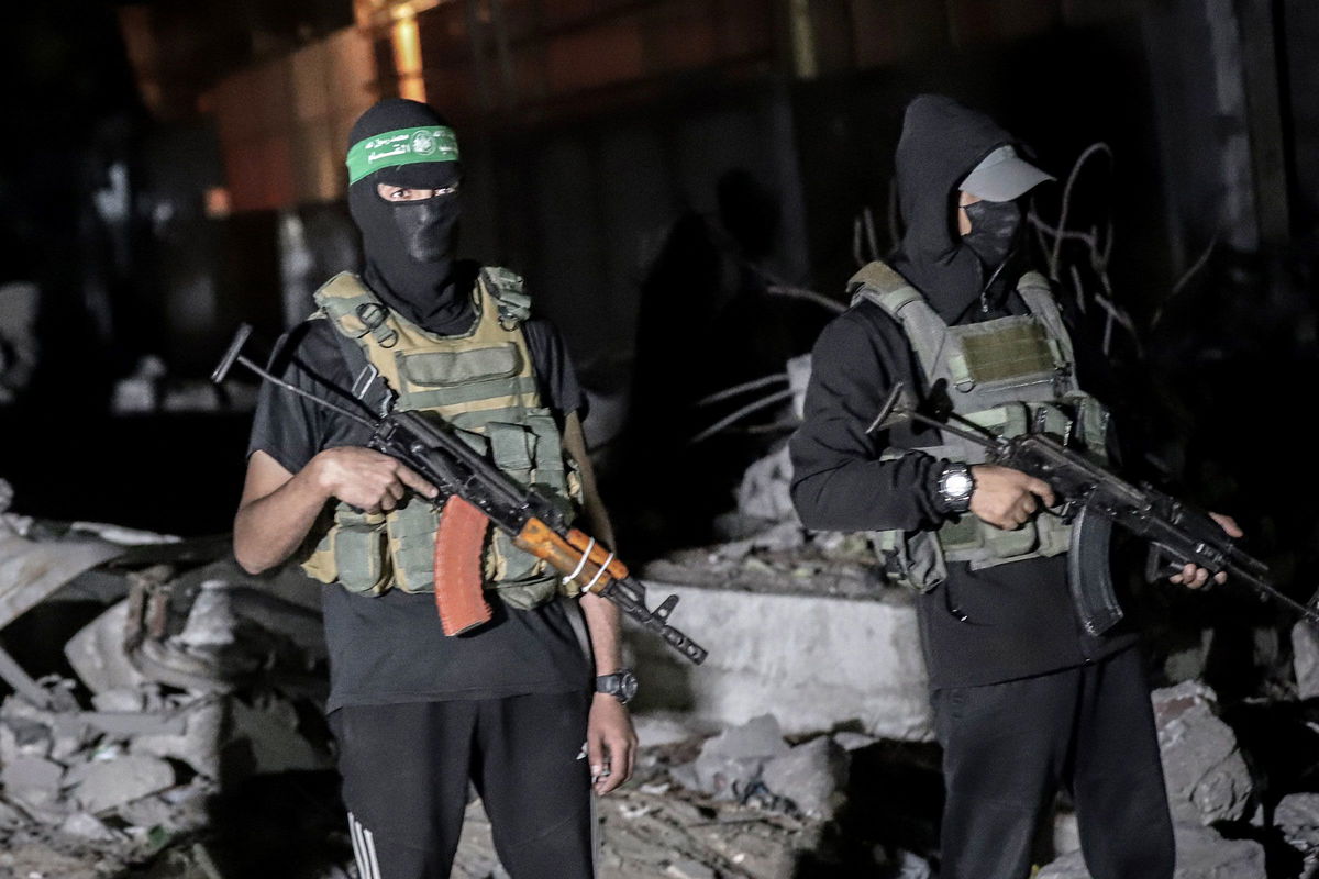 <i>Ahmad Salem/Bloomberg/Getty Images via CNN Newsource</i><br/>Palestinian militants wearing the uniform of the al-Qassam Brigades