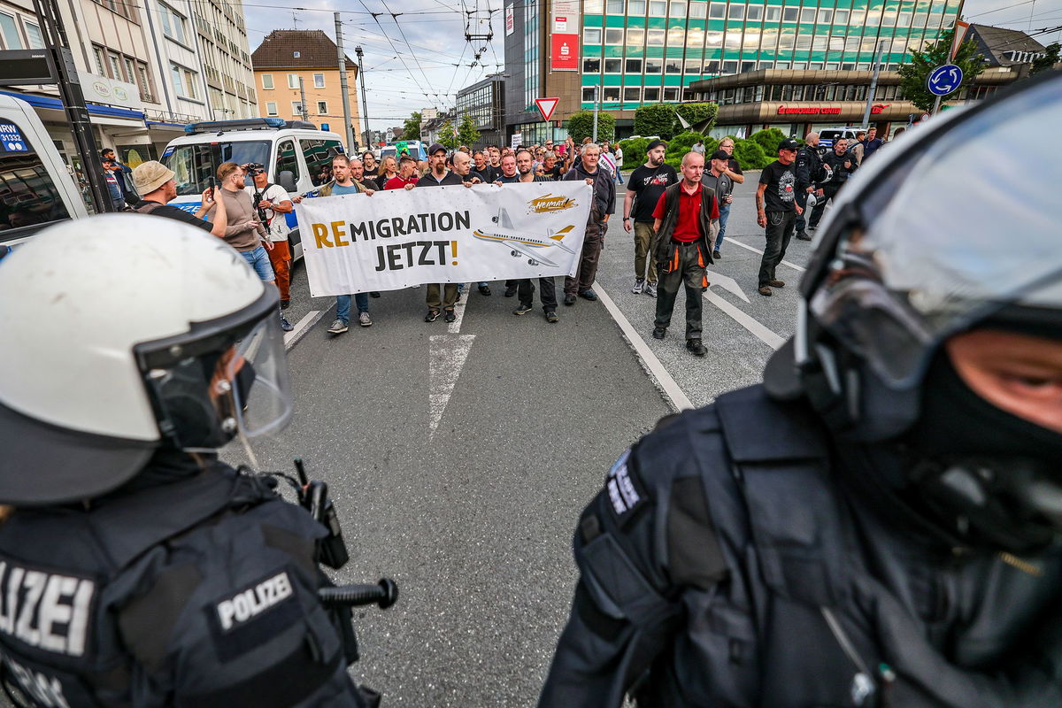 <i>David Canales/SOPA Images/Sipa via CNN Newsource</i><br/>A protester makes the fascist salute during a march organized by the far-right organization Falange Espanola