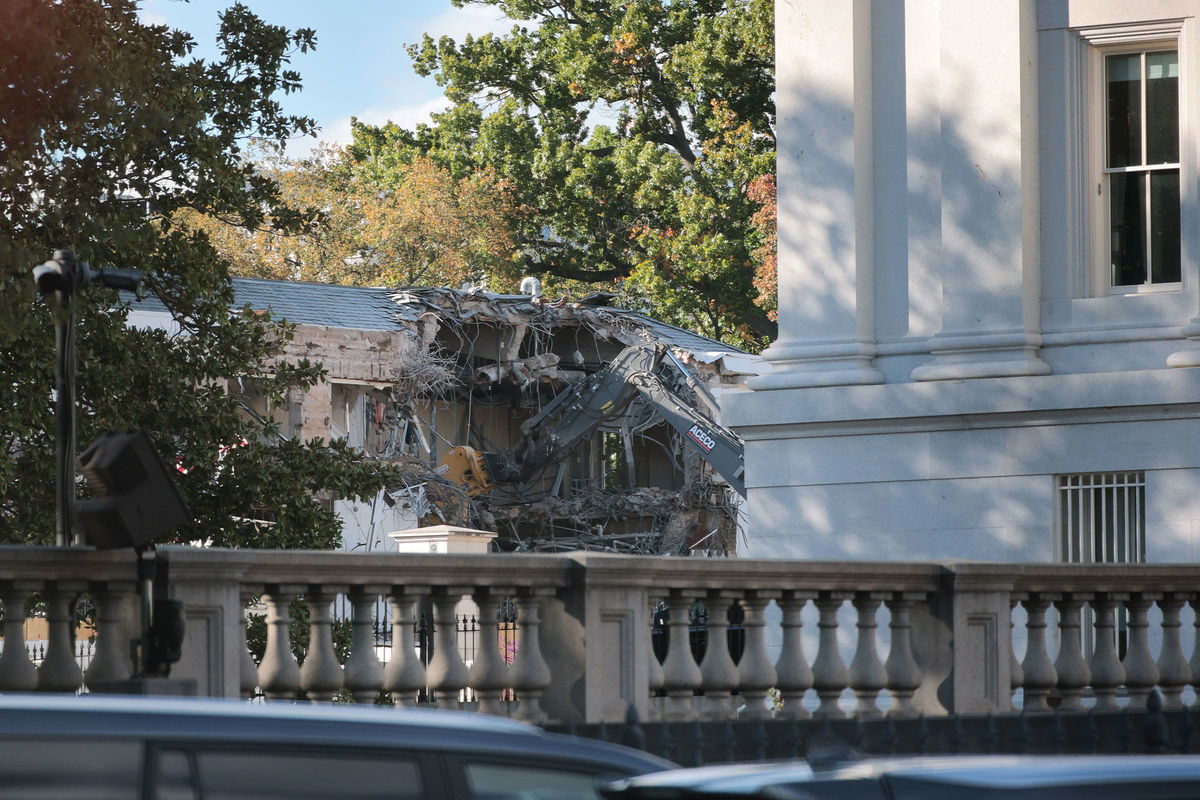 <i>Kevin Dietsch/Getty Images via CNN Newsource</i><br/>Workers demolish the facade of the East Wing of the White House on Monday
